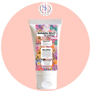 A tube of PEACHY AFFAIR (KERATIN CONDITIONER) from Soak in Love against a pink circular background. The label features colorful flower decorations and lists ingredients, benefits, and usage instructions. Infused with the enriching power of Banana Almond Oil, its capacity is marked as 250 ml.