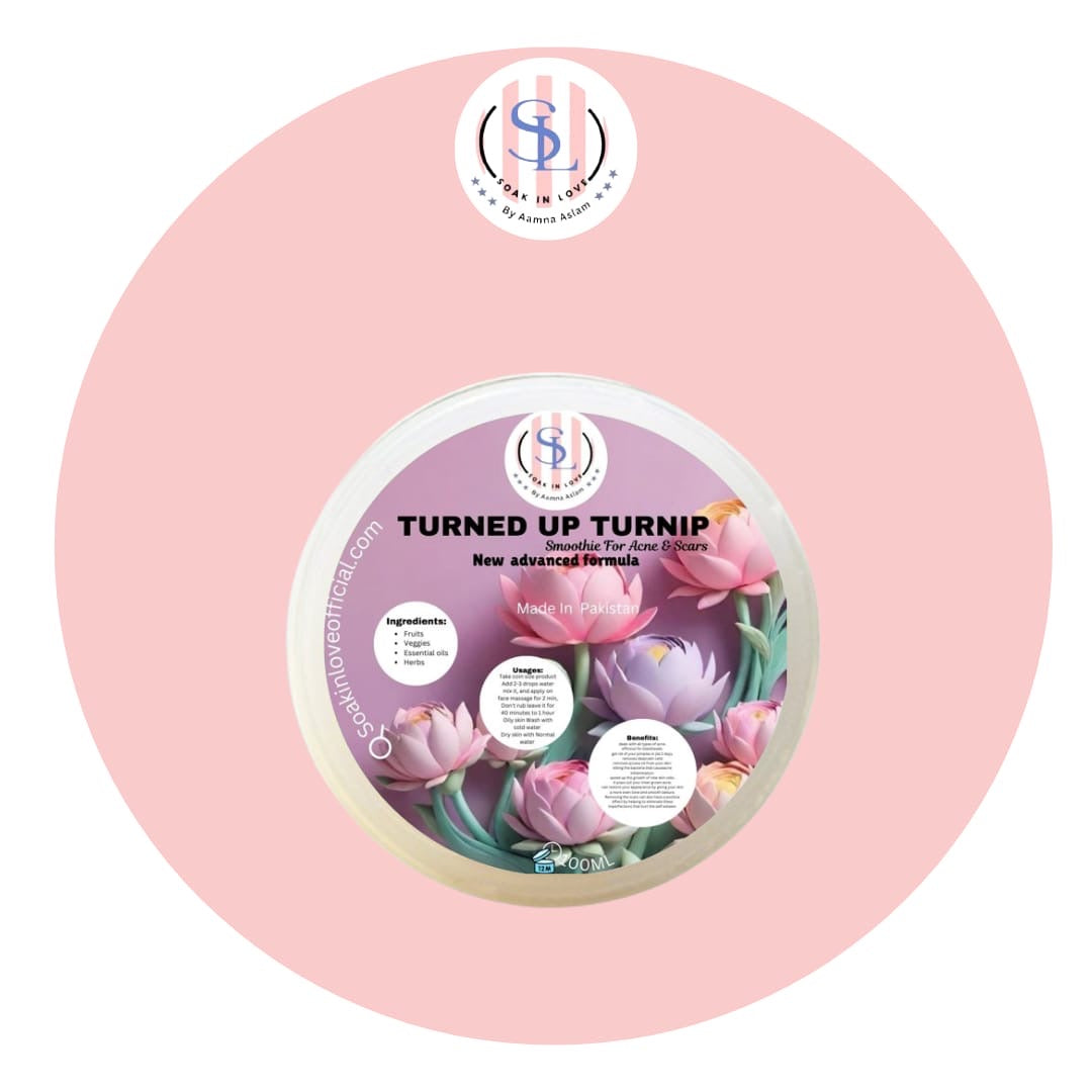 A round skincare product container labeled "TURNED UP TURNIP" from the brand Soak in Love, adorned with floral graphics and branding text, promises to combat acne scars. The container is elegantly displayed against a pink circular background.